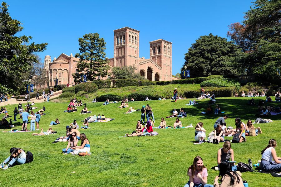 Students on the lawn with Royce Hall in background