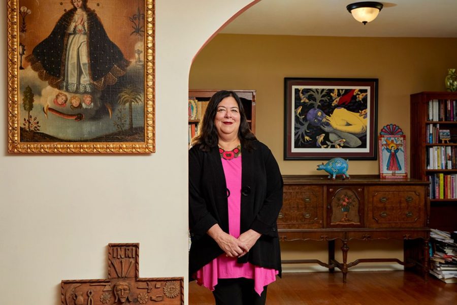 Charlene Villasenor Black amid her personal art collection