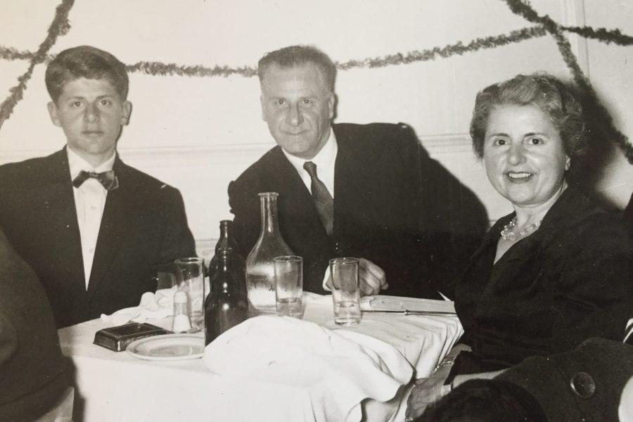 A black and white photo of Peter J. Caloyeras with his parents Ioannis P. and Eirini Caloyeras