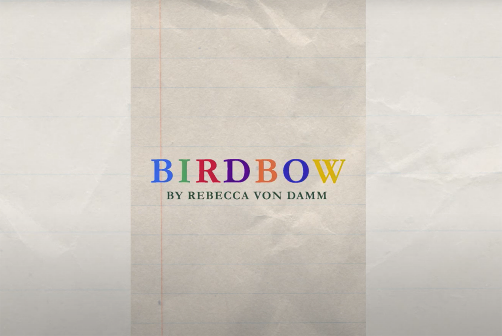 Text reading "Birdbow" and "By Rebecca von Damm" on a notebook page