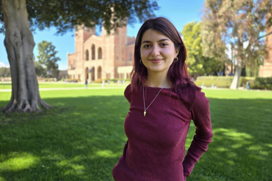 Victoria Gutierrez at UCLA Dickson Plaza with Royce Hall in the background