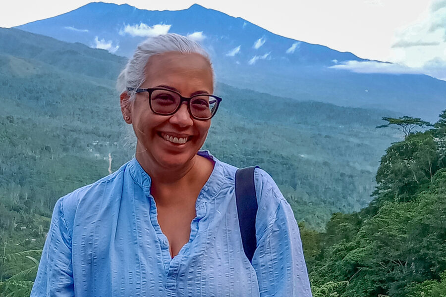 Oona Paredes in Philippines with mountain in background