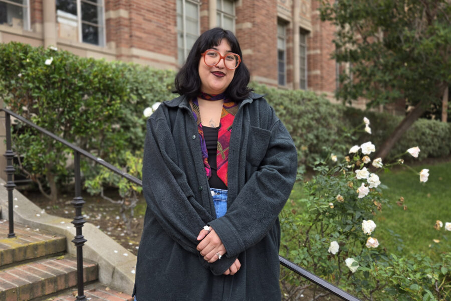 Nat Escobedo on the steps outside of Kaplan Hall